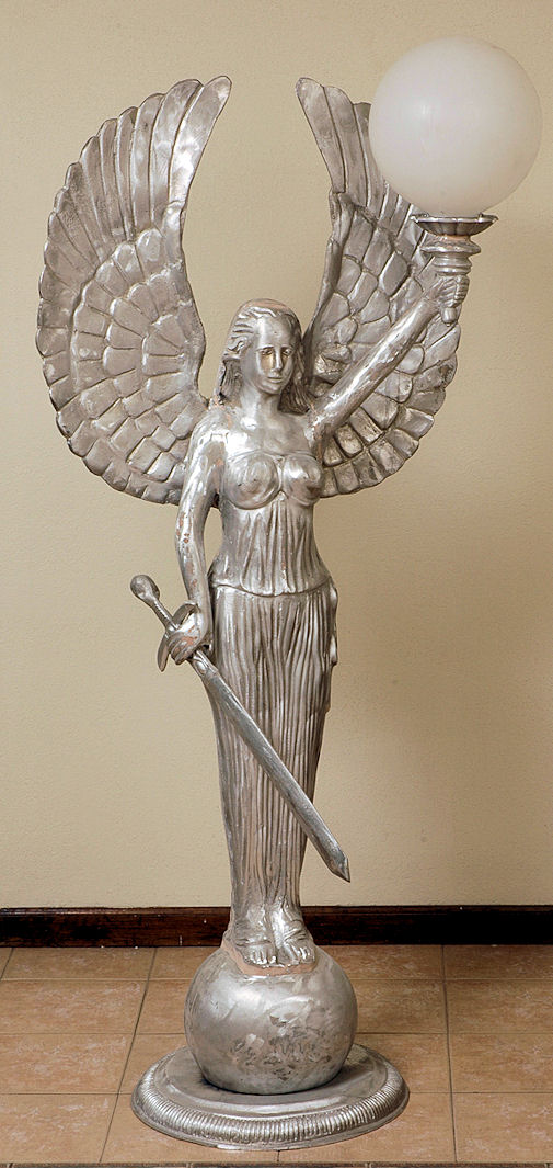 angel statue with sword and light made from aluminum castings
