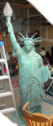 statue of liberty 89 inches tall with glass flame globe