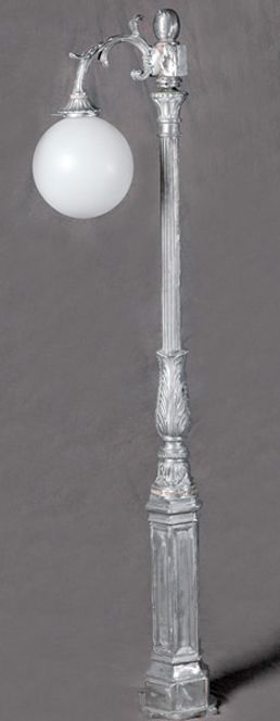 early American lamp post with sngle light arm down