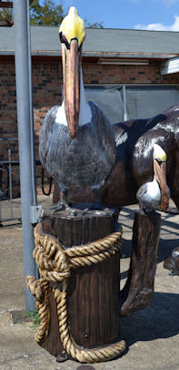 pelicans on post aluminum statue