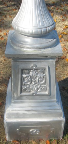 detail photo of large extended urn base for victorian street lamps