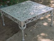 Cast aluminum Dolphin style occasional square table, model A-5122
