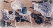Cast aluminum Grape patio settee set with two chairs, one settee, and one small table, model A-5430